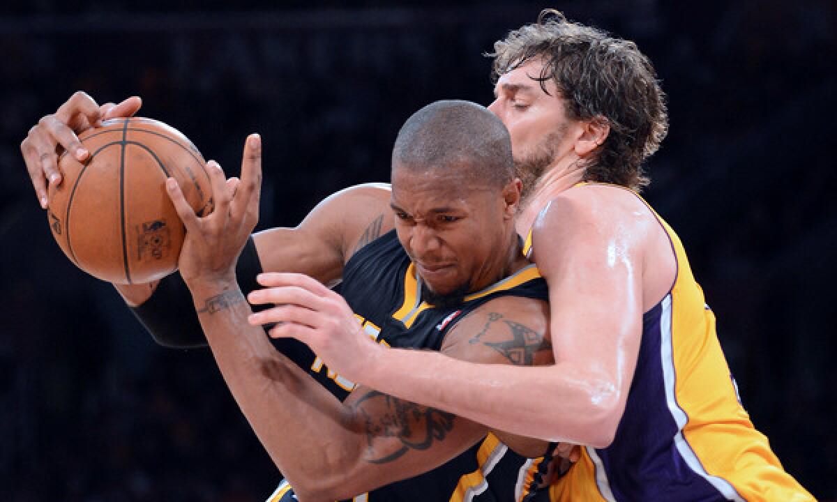 Lakers center Pau Gasol, guarding Pacers power forward David West, appears to be the subject of trade talks again.