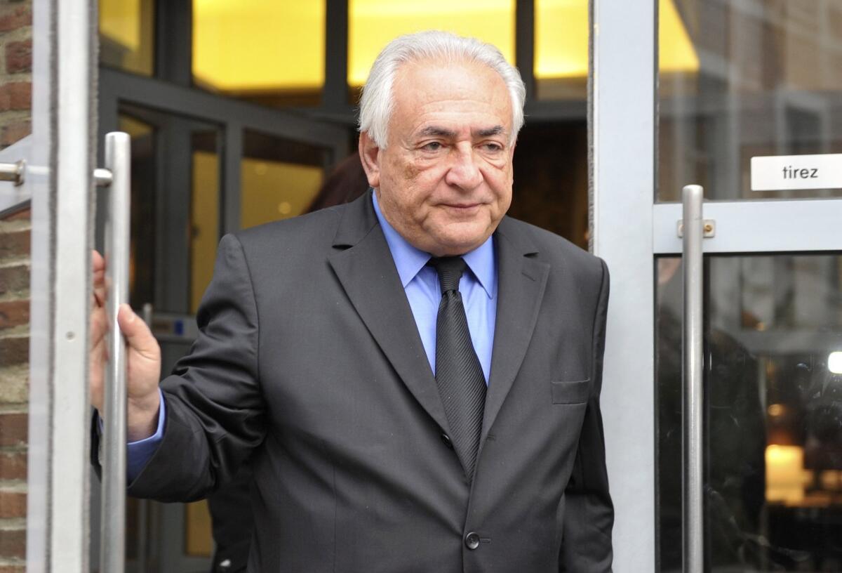 Former International Monetary Fund chief Dominique Strauss-Kahn leaves his hotel in France on Monday.