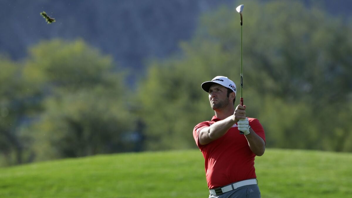 Jon Rahm of Spain plays his shot on the 14th hole during the final round of the CareerBuilder Challenge at the TPC Stadium Course at PGA West.