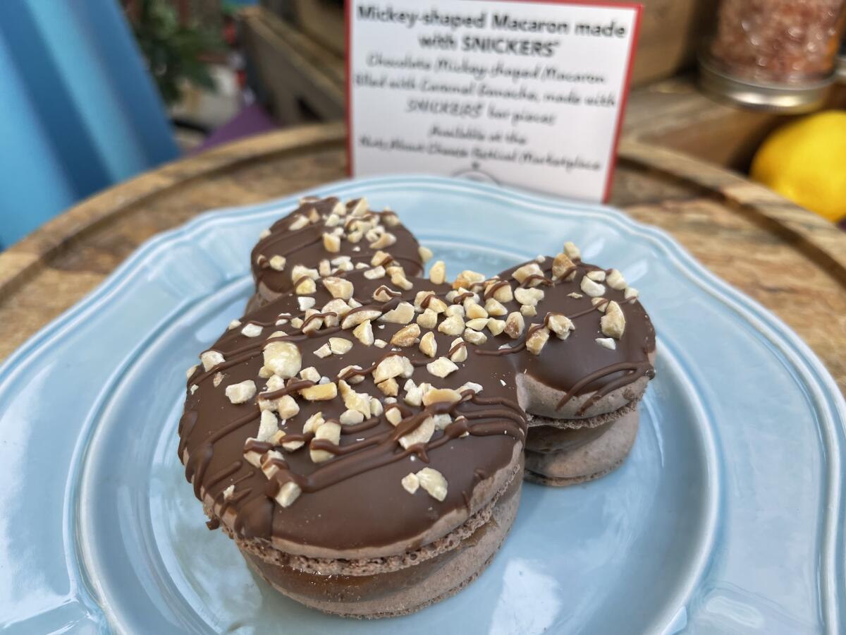 A Mickey-shaped Macron made with Snickers at the 2024 Disney California Adventure Food & Wine Festival.