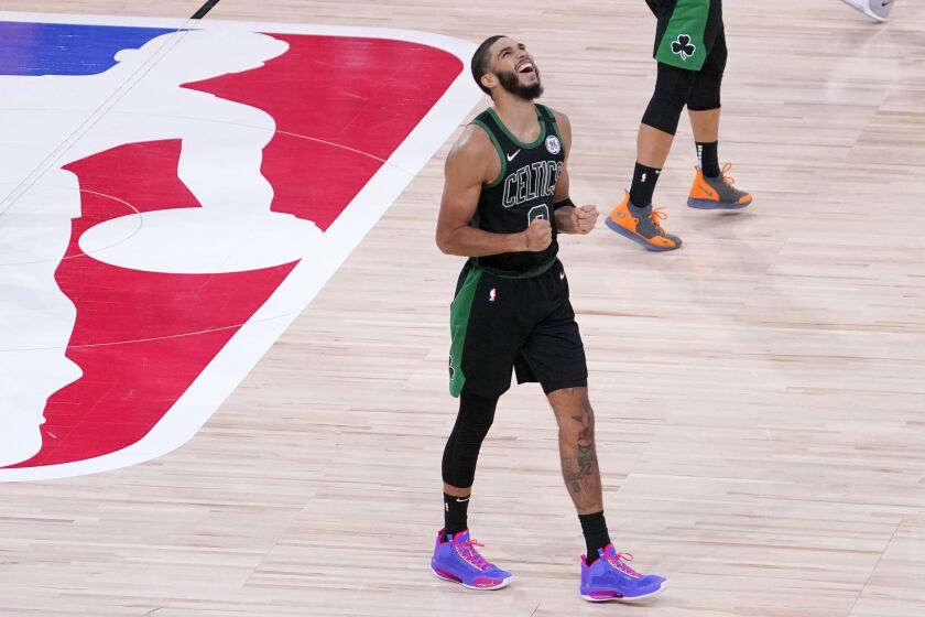 The Celtics' Jayson Tatum celebrates after Boston defeated Toronto on Sept. 11, 2020.