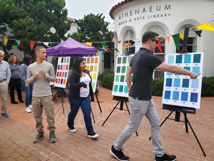Guests gather in May at the Athenaeum Music & Arts Library to choose a color for the "Your Favorite Color" mural.