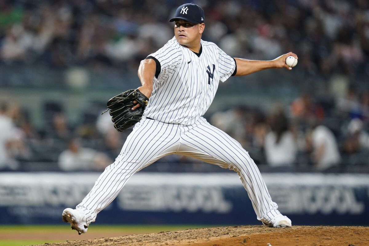 New York Yankees' Manny Banuelos pitches during the eighth inning of the team's baseball game against the Detroit Tigers on Friday, June 3, 2022, in New York. (AP Photo/Frank Franklin II)