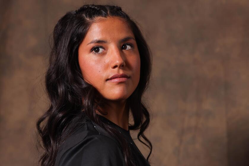 Stefany Ferrer Van Ginkel, a player on the Angel City football club, poses for a portrait