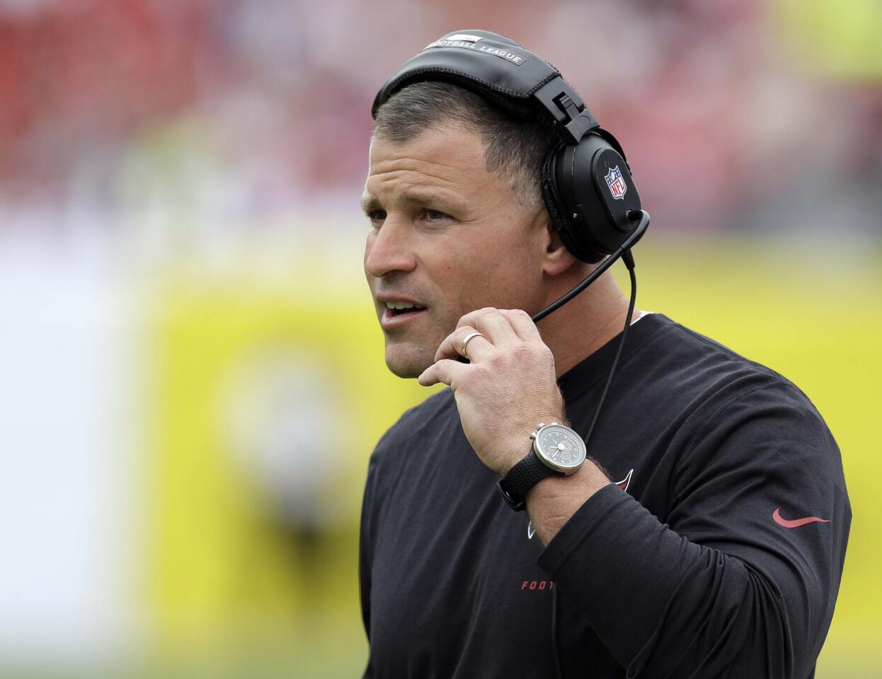 In this Sunday, Dec. 15, 2013 file photo, Tampa Bay Buccaneers head coach Greg Schiano watches during an NFL football game against the San Francisco 49ers. The Bucs announced Dec. 30, 2013 that they fired Schiano, who was UM's defensive coordinator from 1999-2000.