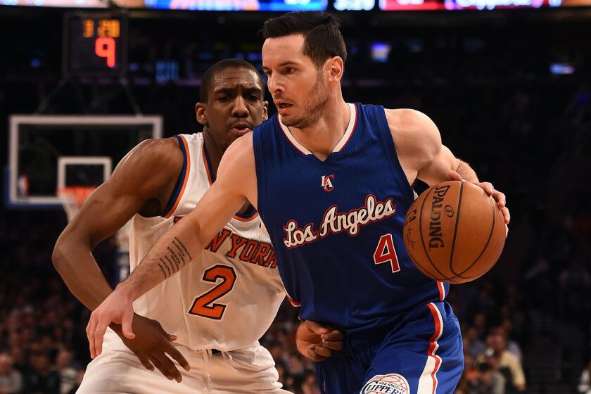 Clippers guard J.J. Redick (4) drives past Knicks guard Langston Galloway on Wednesday night in New York.