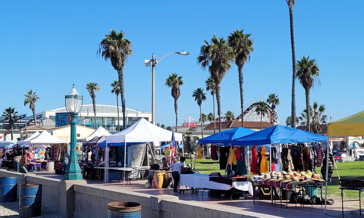 A row of vendor tents in Mission Beach Park