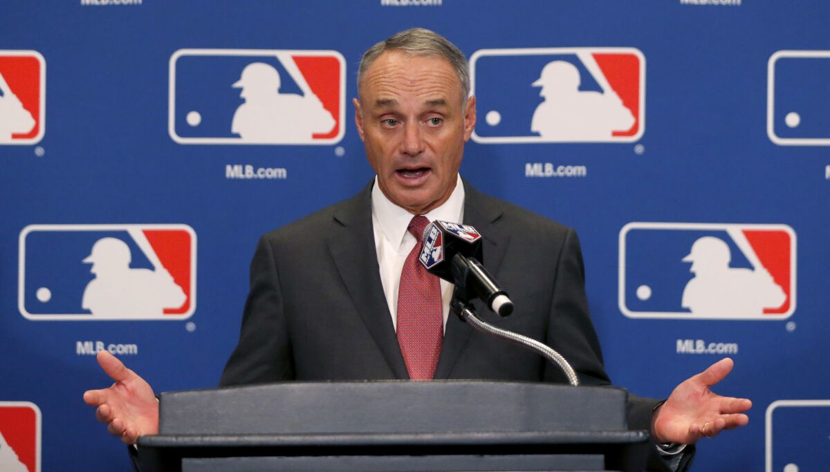Baseball Commissioner Rob Manfred doesn't see a problem with tank jobs, but MLB attendance fell last season to its lowest level since 2002.
