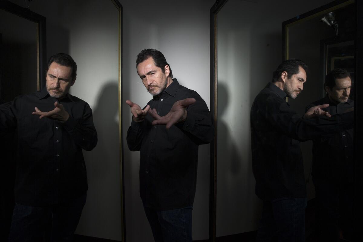 After a rehearsal of the Mark Taper Forum's production of "Zoot Suit," Demian Bichir tries out one of his poses as the show's host, narrator and mythic zoot suiter known as El Pachuco.