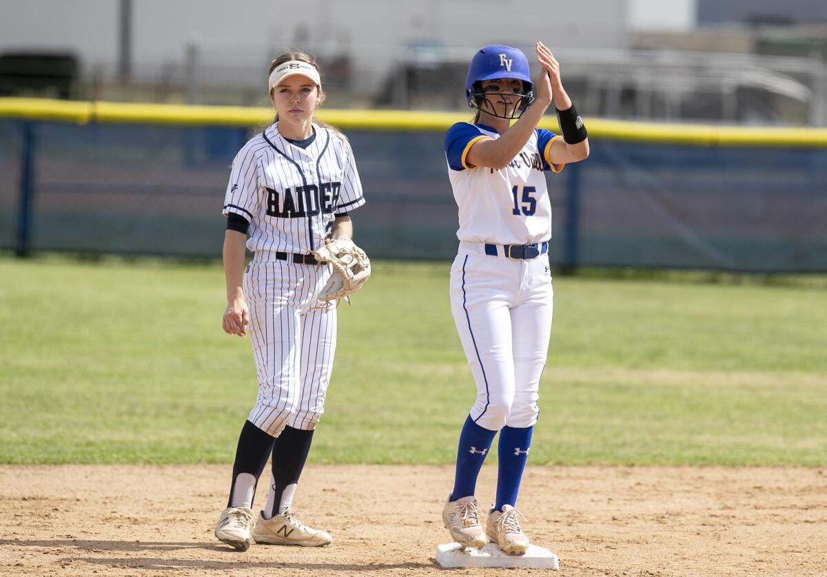 Fountain Valley's Kileigh Villalobos celebrates after hitting a double against Sonora on Tuesday.