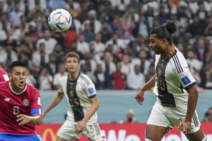 Germany's Serge Gnabry scores his side's opening goal during the World Cup group E soccer match between Costa Rica and Germany at the Al Bayt Stadium in Al Khor, Qatar, Thursday, Dec. 1, 2022. (AP Photo/Matthias Schrader)