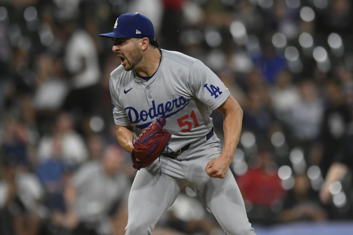 Dodgers closing pitcher Alex Vesia celebrates after the final out of a 3-0 win over the Chicago White Sox on Monday.