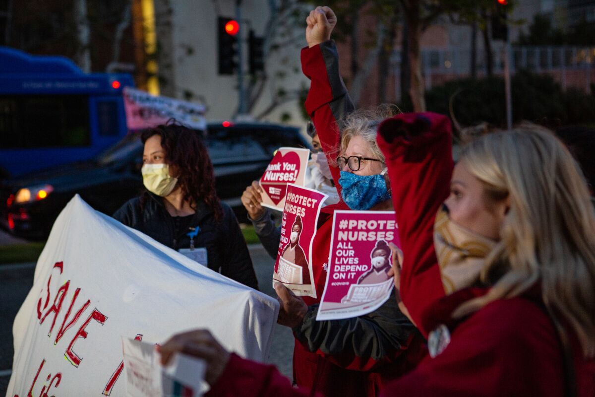 Nurses gather to protest the lack of personal protective equipment at the UCLA Ronald Reagan Medical Center in Los Angeles on Thursday, April 16, 2020.