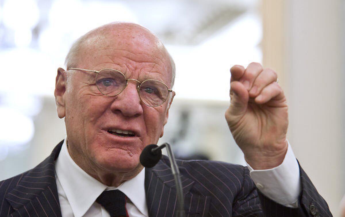 Barry Diller looks like he's playing the world's smallest violin just for broadcasters.