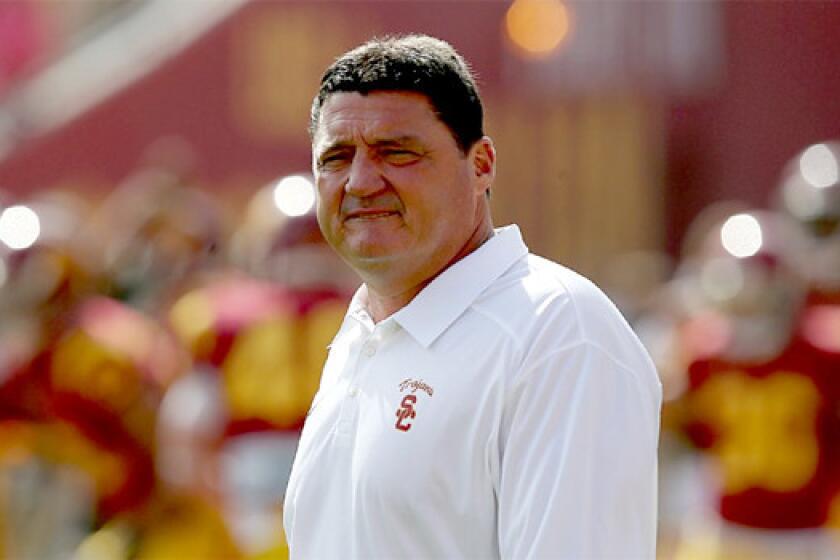 Ed Orgeron led USC to a 6-2 record as interim coach after taking over for Lane Kiffin last season.