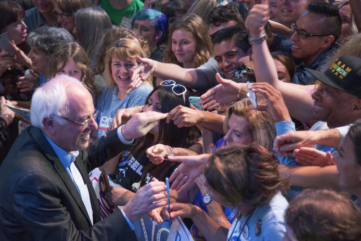 Democratic presidential candidate Bernie Sanders greets supporters at a campaign fundraising reception at the Avalon Hollywood nightclub on Oct. 14.