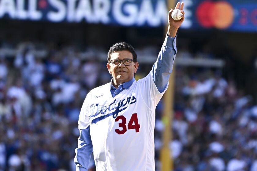 LOS ANGELES, CA - JULY 19: Fernando Valenzuela prepares to throw out the first pitch.