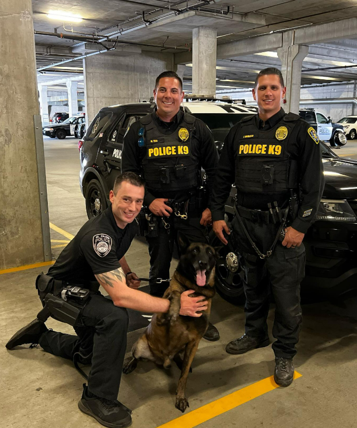 El Cajon police dog Jester and his handler Officer Randall Gray, left.