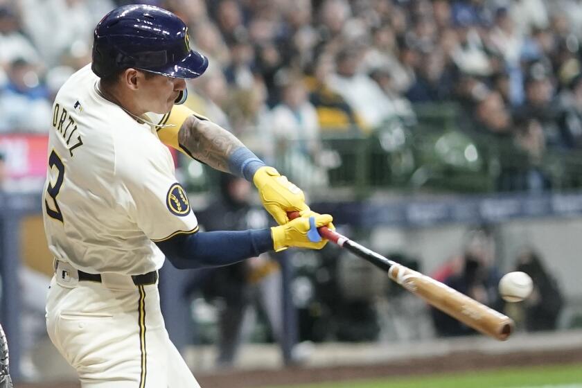 Milwaukee Brewers' Joey Ortiz hits a two-run home run during the second inning of a baseball game against the New York Yankees Friday, April 26, 2024, in Milwaukee. (AP Photo/Morry Gash)