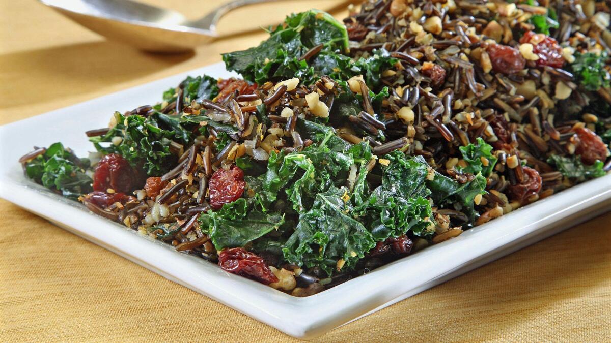 Kale and wild rice salad with raisins and walnuts.