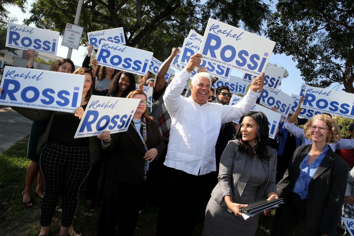 Former public defender Rachel Rossi announces her entry into the Los Angeles County district attorney's race at a press conference with family and supporters in front of the Century Regional Detention Facility in Lynwood.