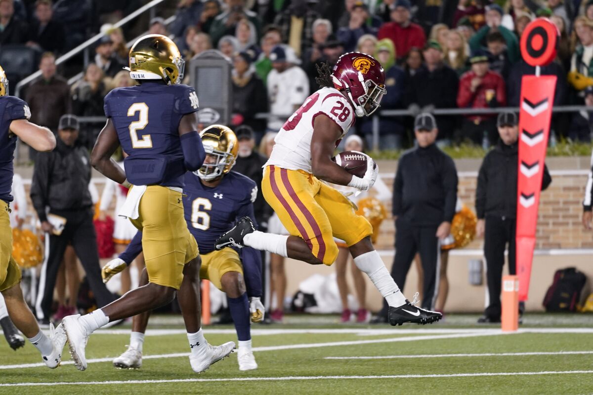 USC running back Keaontay Ingram runs for a four-yard touchdown against Notre Dame 