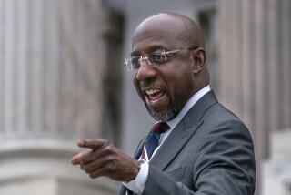 Sen. Raphael Warnock, D-Ga., arrives at the Capitol after defeating Republican challenger Herschel Walker in a runoff election in Georgia last night, in Washington, Wednesday, Dec. 7, 2022. The Democrats' new outright majority of 51-49 in the Senate means Schumer will no longer have to negotiate a power-sharing deal with Republicans and won't have to rely on Vice President Kamala Harris to break as many tie votes. (AP Photo/J. Scott Applewhite)