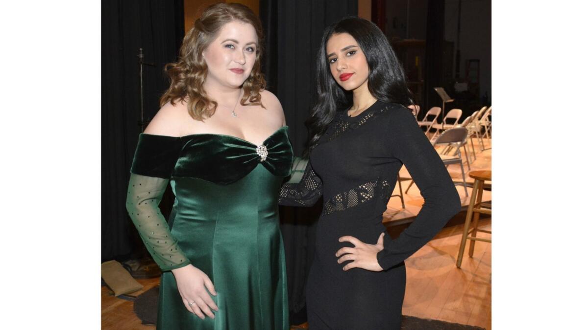 Soprano soloist Esther Tonea, left, preparing for her performance with the designer of her gown, Ahad Alshaea, at last week's 'Fashion Meets the Phil' concert.