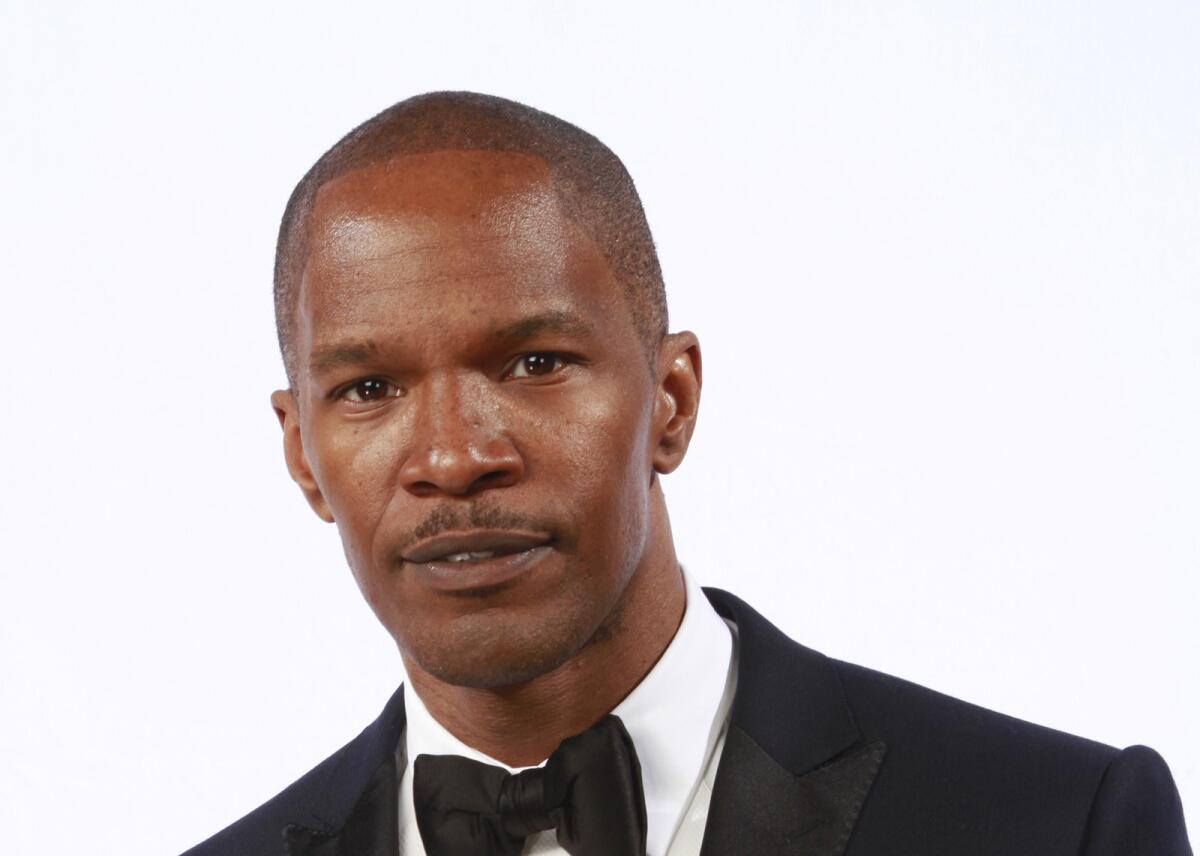 Jamie Foxx is reportedly attached to play Mike Tyson in an upcoming biopic.
