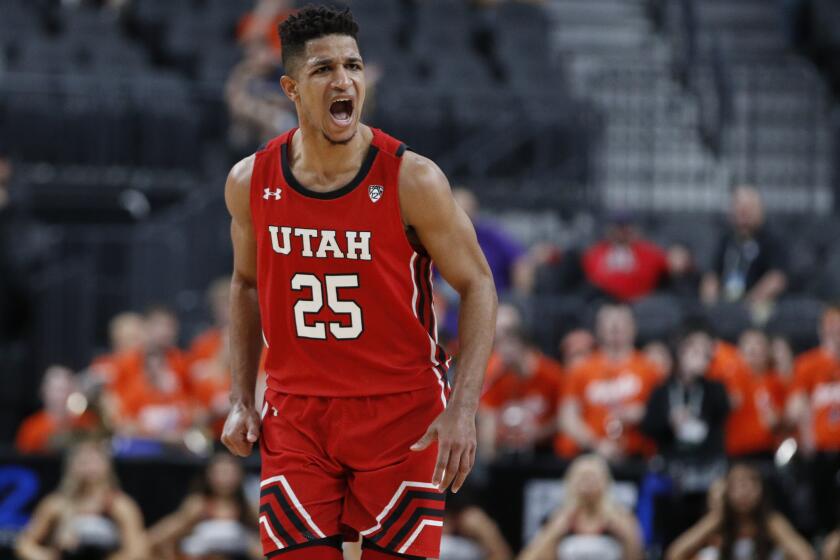 Utah's Alfonso Plummer (25) reacts after making a 3-point shot against Oregon State during the first half of an NCAA college basketball game in the first round of the Pac-12 men's tournament Wednesday, March 11, 2020, in Las Vegas. (AP Photo/John Locher)