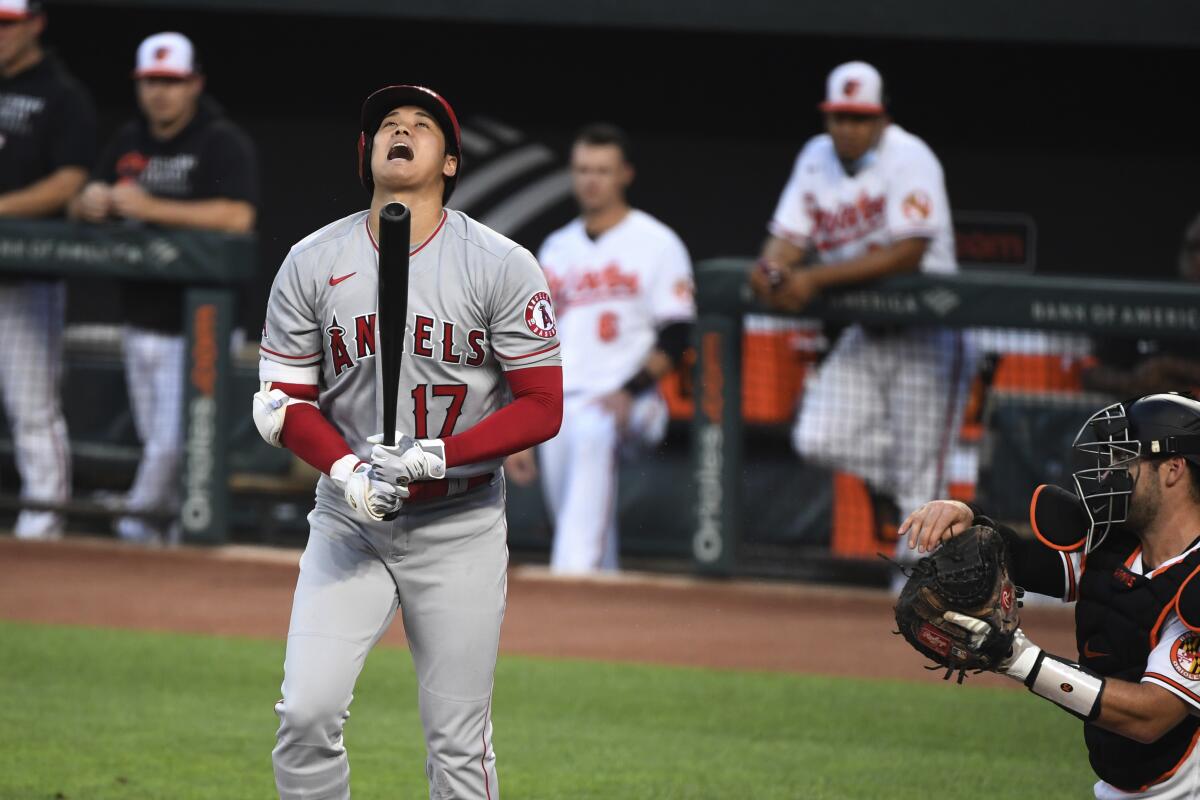 Angels star Shohei Ohtani (17) reacts to striking out against the Orioles 
