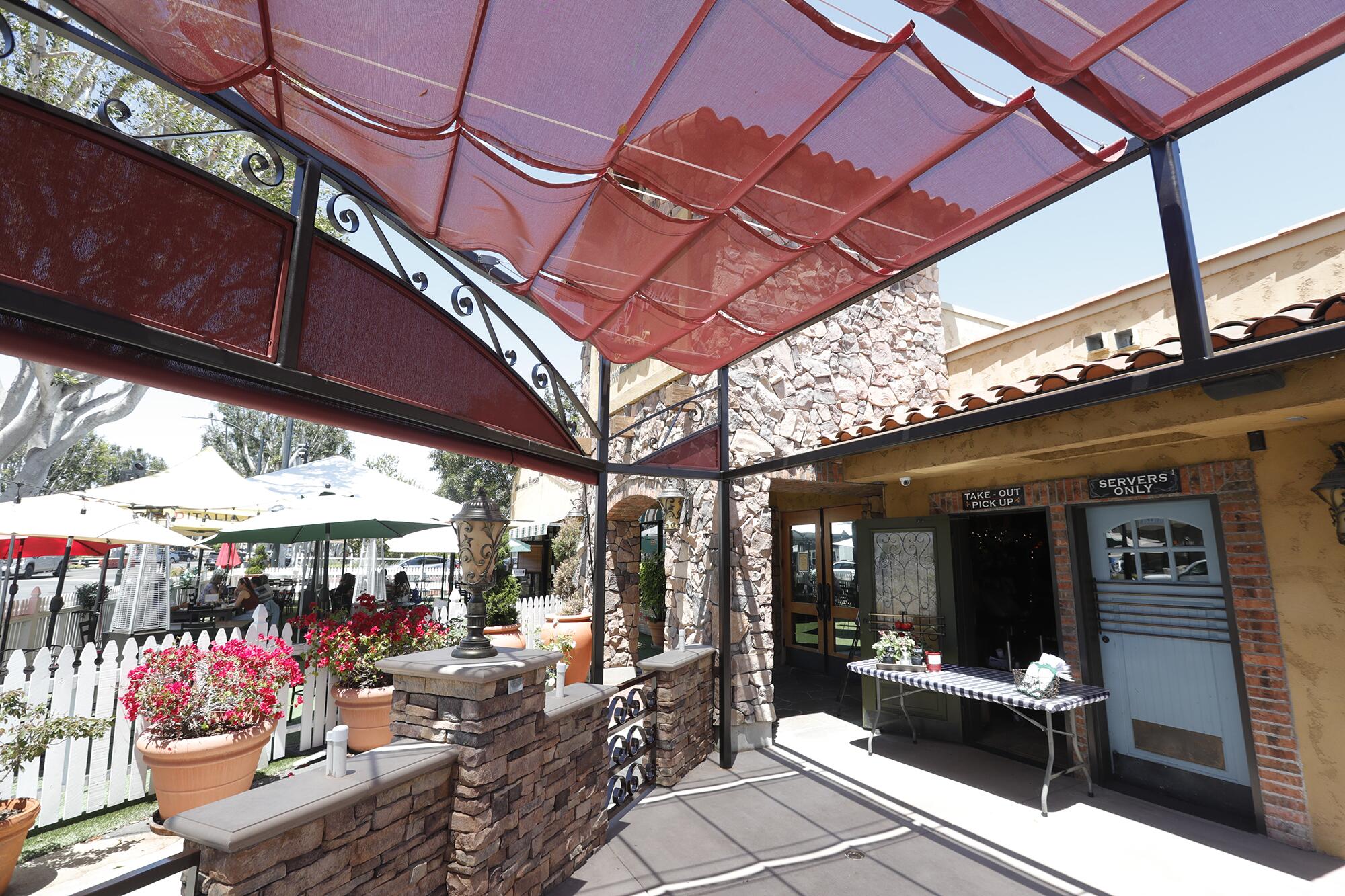The outdoor dining and takeout space of the Roma D' Italia restaurant in Old Town Tustin.