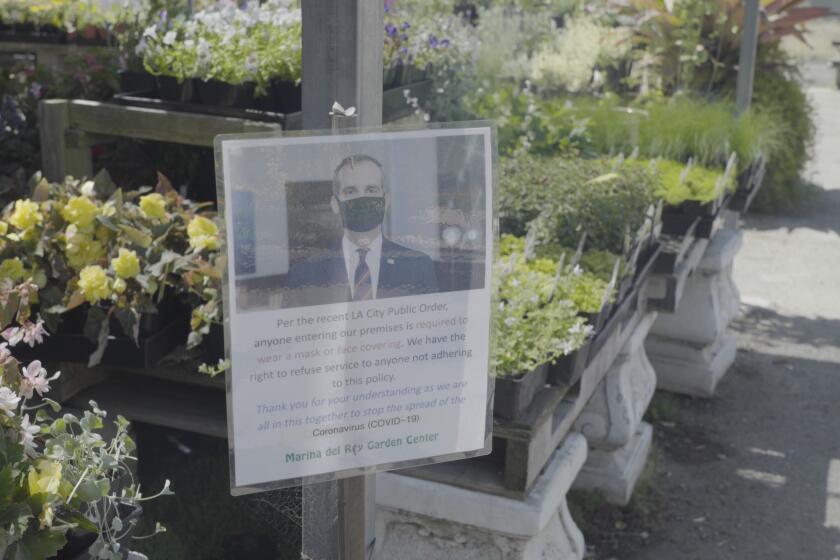 LOS ANGELES-The Marina del Rey Garden center is open and requires customers to wear a mask. (Photo By Claire Hannah Collins / Los Angeles Times)