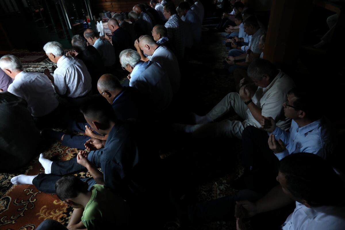 Poland: Muslims attend morning prayers during Eid al-Adha at a mosque in the village of Kruszyniany.