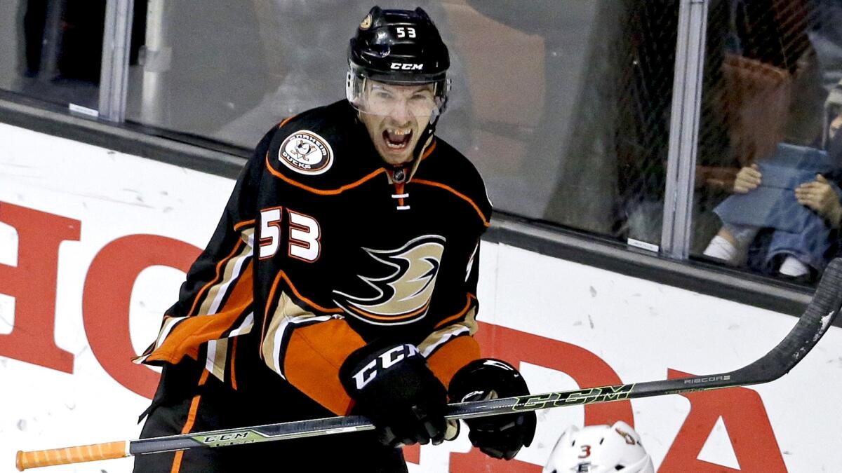 Ducks defenseman Shea Theodore celebrates after scoring a goal against the Senators during the third period Wednesday night.