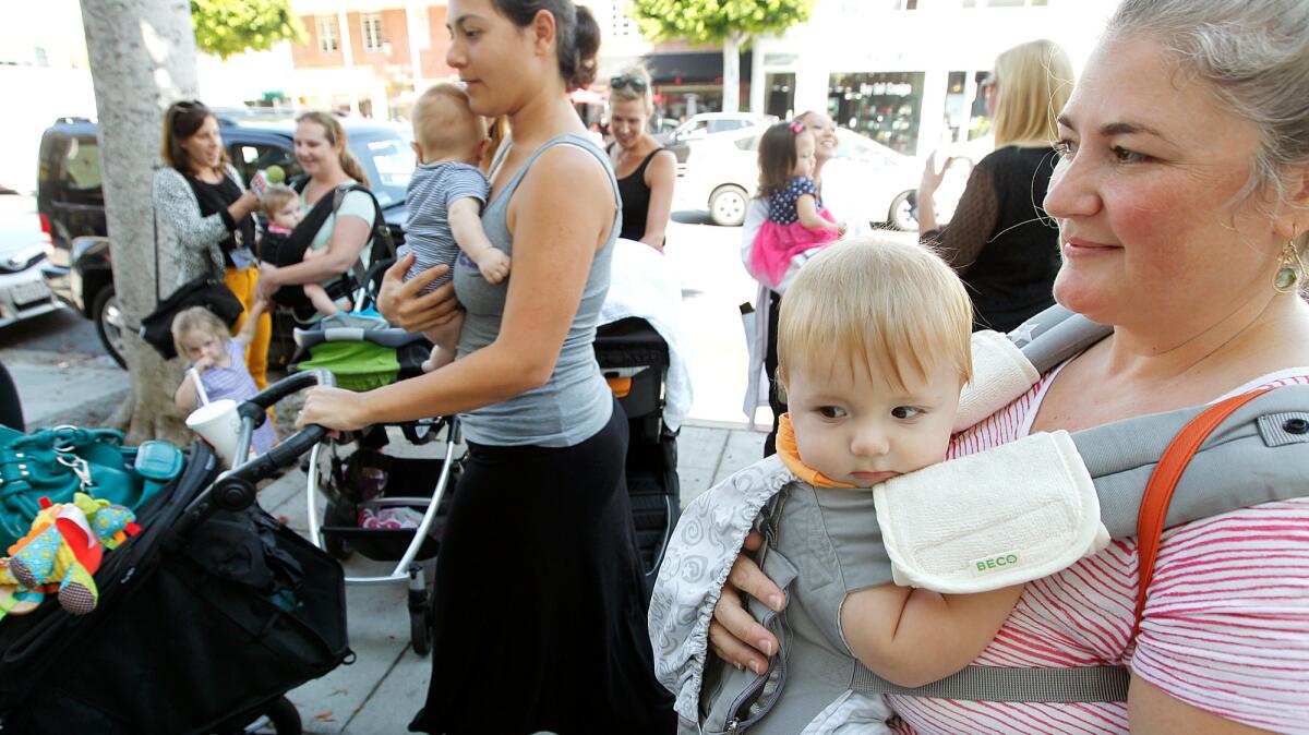 A group of mothers gather for a "nurse-in"in Beverly Hills on August 20, 2014.