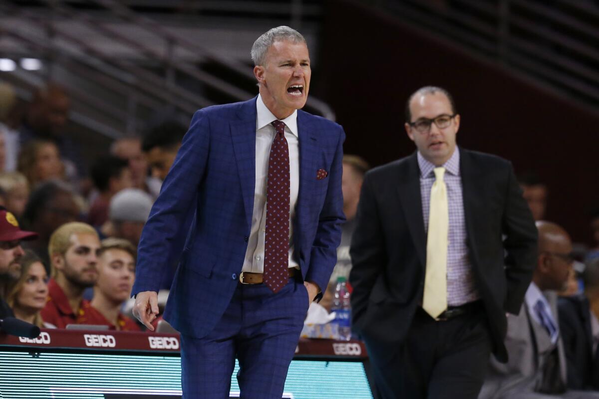 USC coach Andy Enfield argues a foul call against the Trojans during the first half of a game against Utah on Jan. 30 at Galen Center. 