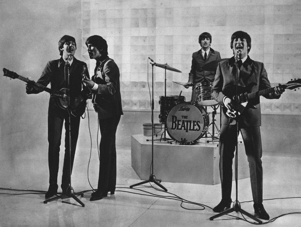 FILE - The Beatles are seen performing, date unknown. From left to right: Paul McCartney, George Harrison, Ringo Starr, and John Lennon. McCartney has revisited the breakup of The Beatles, refuting the suggestion that he was responsible for the group’s demise. Speaking on an episode of BBC Radio 4’s “This Cultural Life’’ that is scheduled to air Oct 23, McCartney said it was John Lennon who wanted to disband The Beatles. (AP Photo)