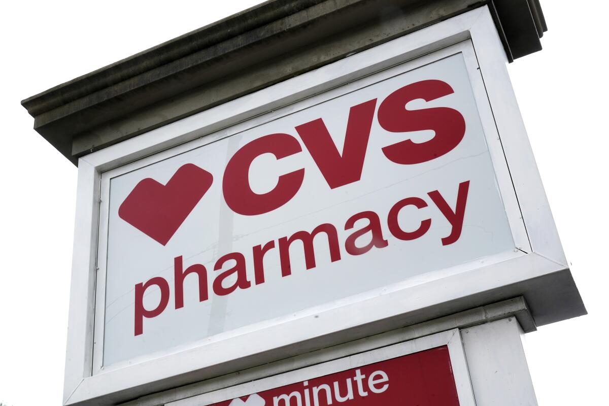 A CVS Pharmacy sign.