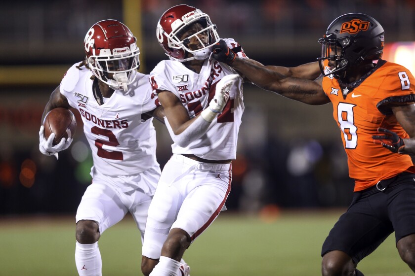 Brooks Leads No 7 Oklahoma Past No 21 Oklahoma State The