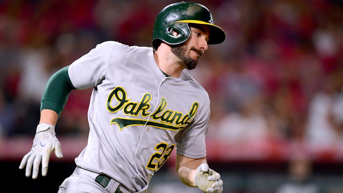 Matt Joyce rounds first base after hitting a double against the Angels during the sixth inning Friday night.