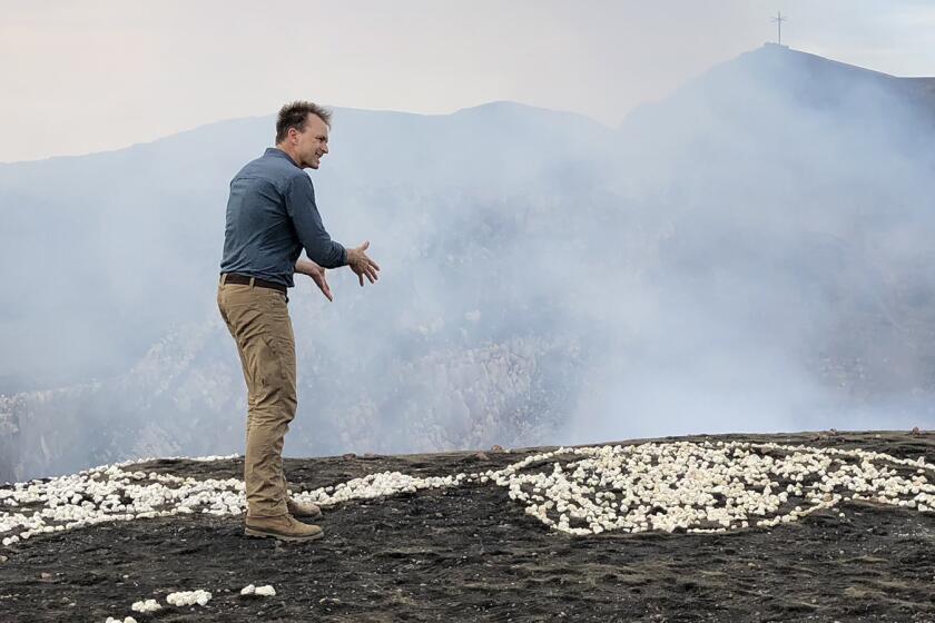 Explorer -- National Geographic TV Series, Masaya, Nicaragua - Explorer Host, Phil Keoghan, with the map of the Ring of Fire that he created with rocks. (National Geographic/Michael Churton) Phil Keoghan in "Explorer" on National Geographic.