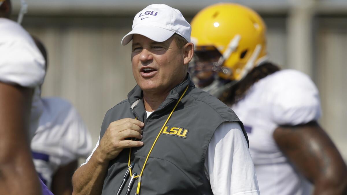 LSU Coach Les Miles runs drills during a team practice session in Baton Rouge, La., on Aug. 6. LSU might have lost a lot of players to the NFL, but Miles has a knack for replenishing his program with top talent.