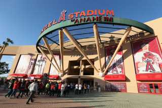 ANAHEIM, CA - MARCH 31: Fans enter Angel Stadium of Anaheim on Opening Day.