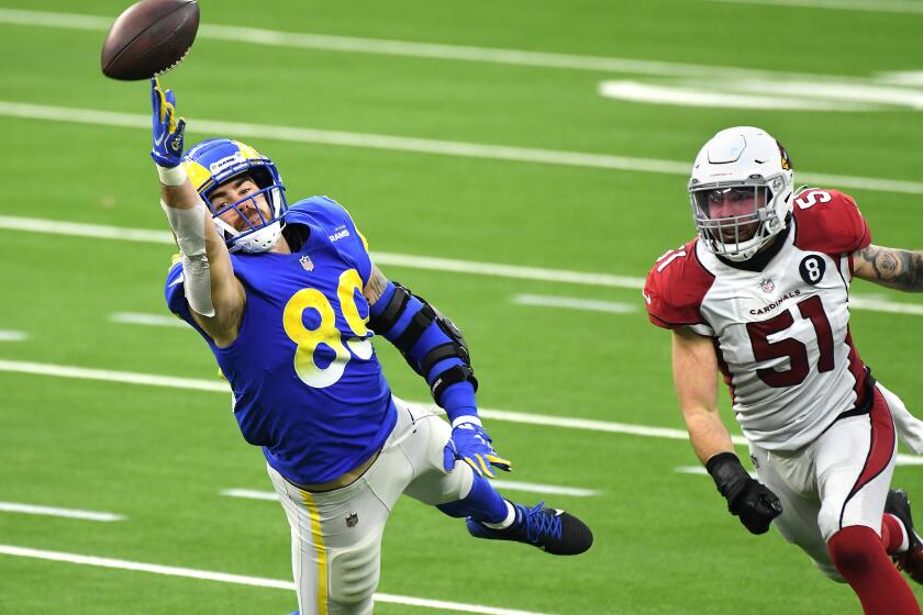INGLEWOOD, CALIFORNIA JANUARY 3, 2021-Rams tight end Tyler Higbee can't make the catch in front of Cardionals linebacker Tanner Vallejo in the 4th quarter at SoFi Stadium in Inglewood Sunday. (Los Angeles Times/Wally Skalij)