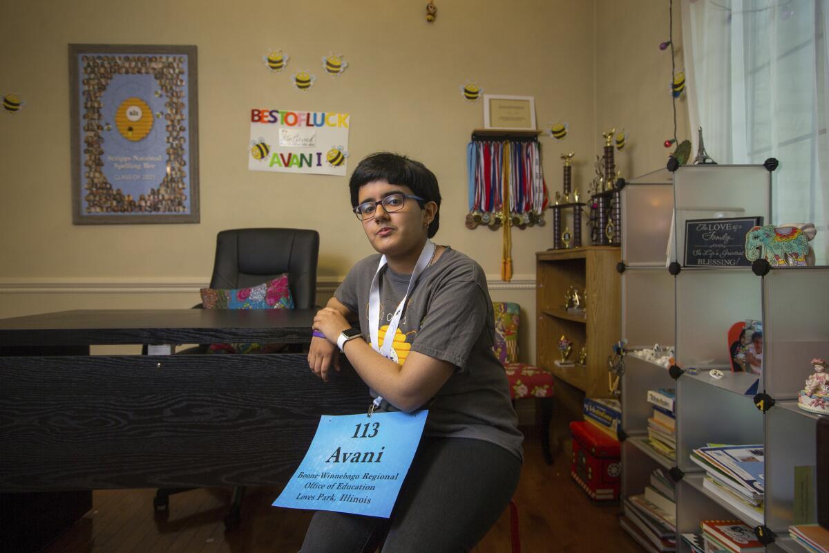 Avani Joshi, a 13-year-old eighth-grader from Roscoe Middle School, poses for a portrait at her home, Thursday, June 24, 2021, in Roscoe, Ill. Joshi is in the semifinals of the Scripps National Spelling Bee. There are 30 spellers left that will compete Sunday night, with 10 advancing to the finals on July 8. (Scott P. Yates/Rockford Register Star via AP)