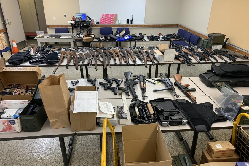 Seizure of firearms by the El Cajon Police Department during a probation check at the residence of John Fencl, where officers found a large chase of illegal firearms in El Cajon, Calif. on July 2, 2021.