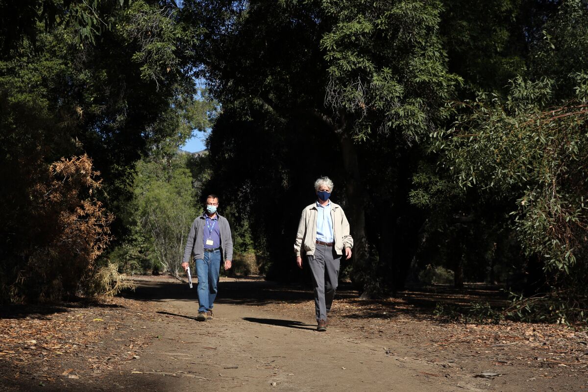 Jim Henrich, left, and Richard Schulhof at the Los Angeles County Arboretum.