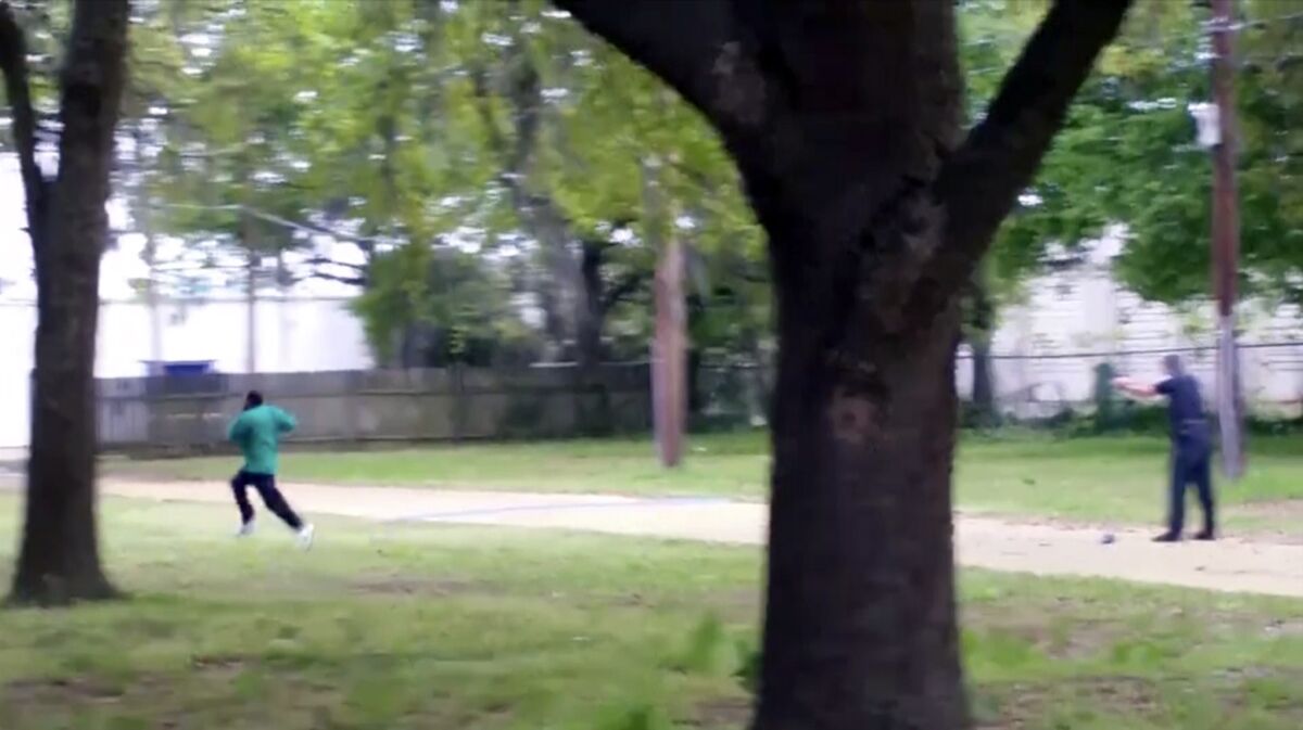 In this April 4, 2015, image from video, Walter Scott, left, is shot by police officer Michael Thomas Slager in Charleston, S.C.