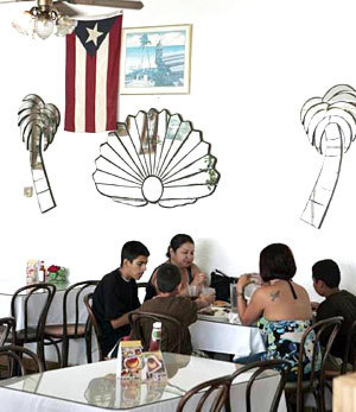 FEEL THE BREEZE? The bright interior of Senor Big Ed evokes a beach atmosphere, with its sparse, sun-bleached walls. The menu has plenty of hefty helpings of traditional Puerto Rican dishes; the sampler plate is best split between two people.